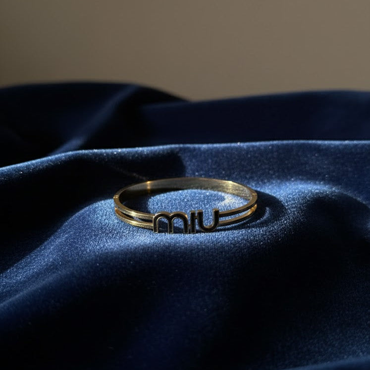 MIU Logo Black Enamel Bangle Bracelet
