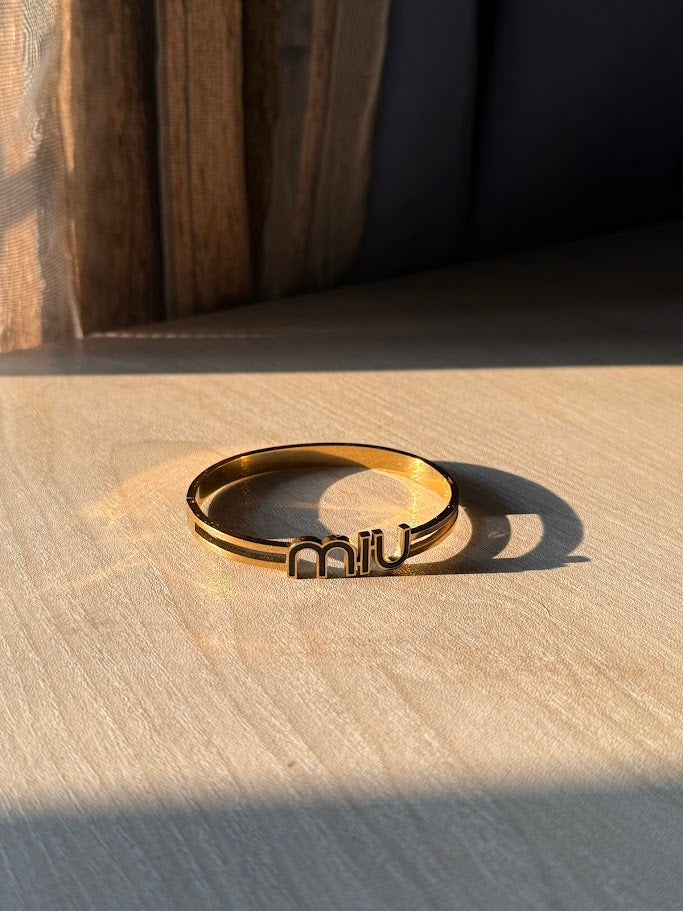 MIU Logo Black Enamel Bangle Bracelet